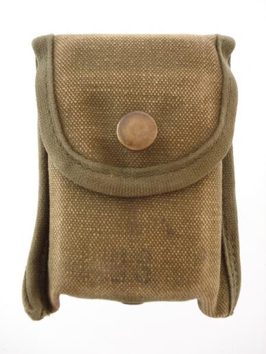 U.S M56 First Field Dressing & Pouch, 1964 Dated